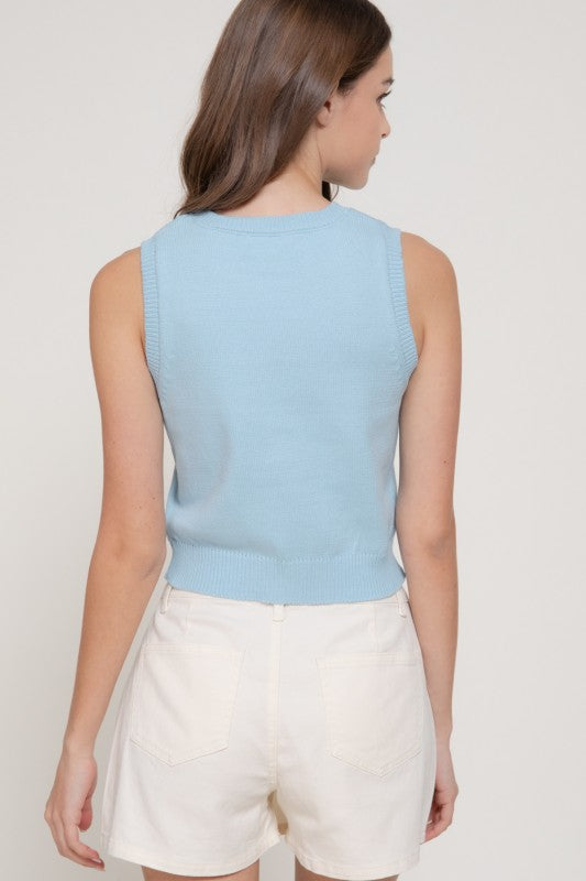 Top celeste de punto jacquard sin mangas con cuello redondo