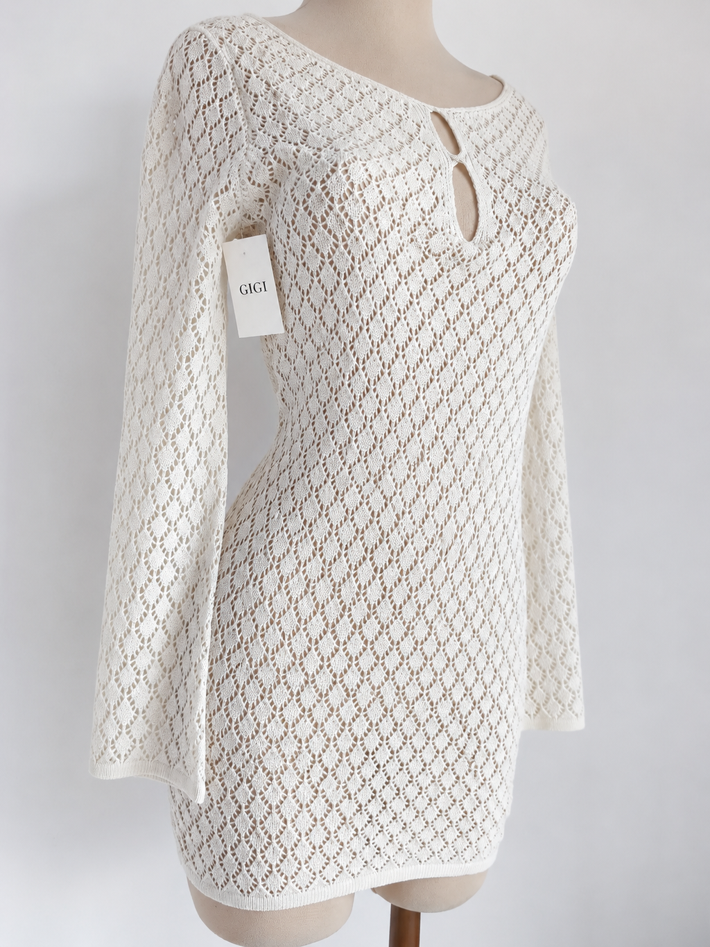 Vestido tejido de manga larga y liso