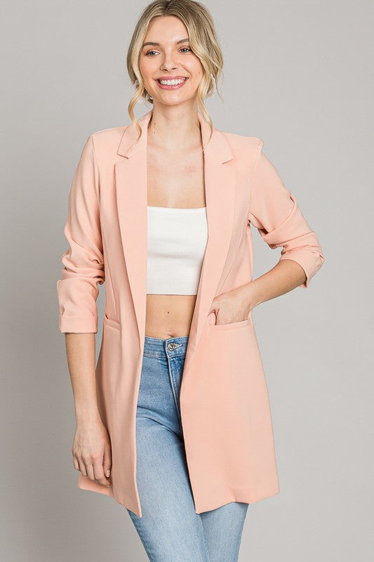 Blazer largo color salmón, sin botones estilo princesa de sarga