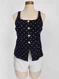 Top negro de lino con lunares y botones dorados