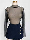 Top de manga larga transparente con cuello alto