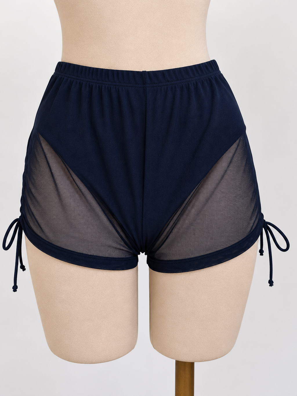 Short negro con transparencia, salida de playa