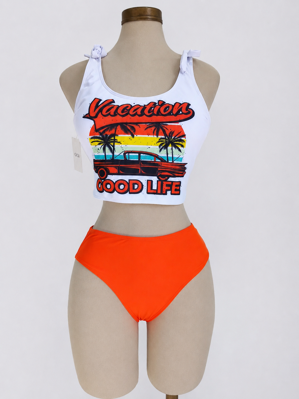 Traje de baño de 2 piezas color naranja con blanco con estampado en top