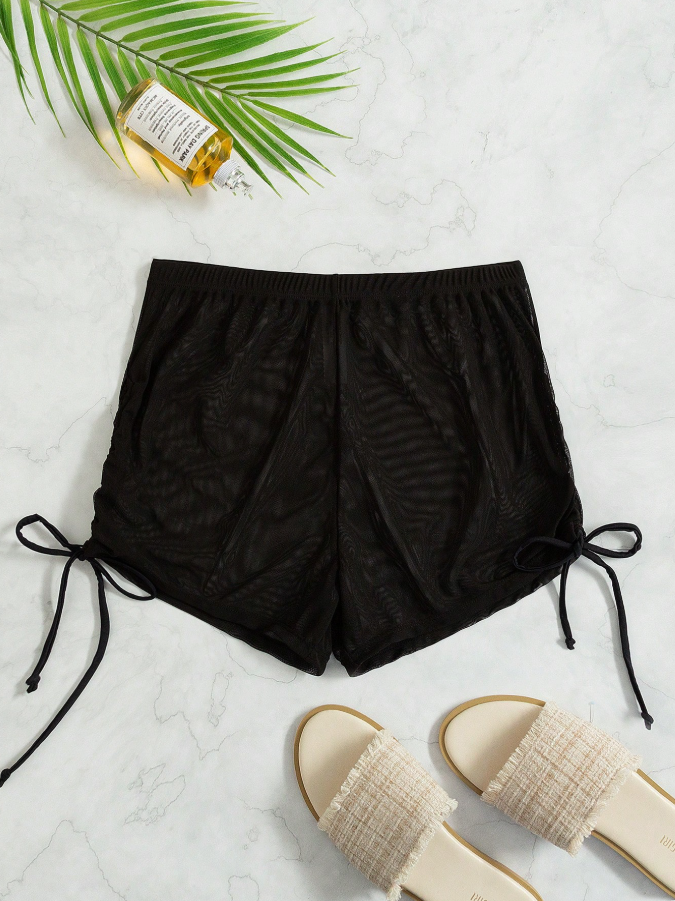 Short negro con transparencia, salida de playa - imagen 4