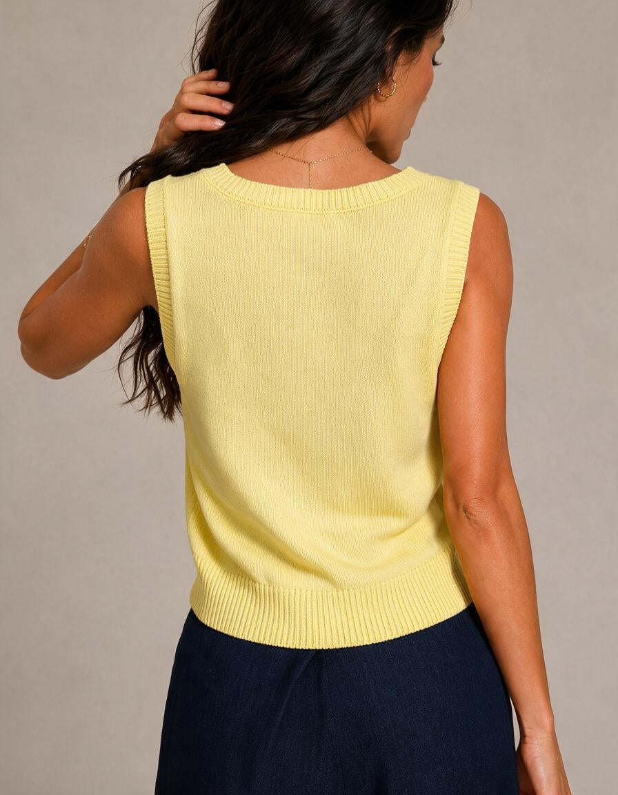 Top amarillo de jacquard sin mangas con cuello redondo