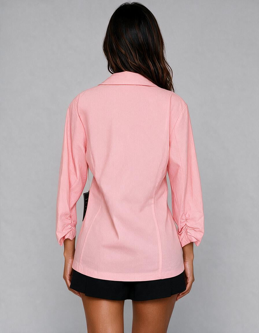 Blazer rosa de lino con mangas fruncidas