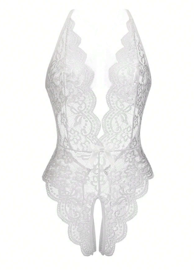 Body de lencería blanco con abertura y espalda cruzada
