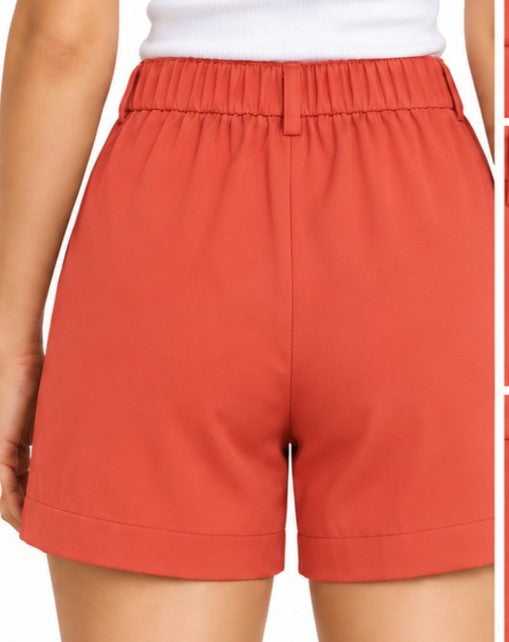 Shorts de satén · Coral y naranja