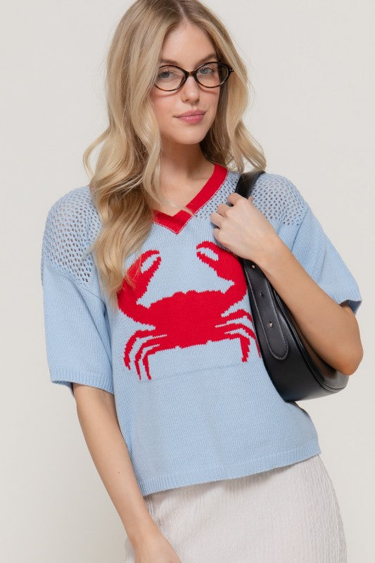 Top de jacquard de manga corta con escote en v y banda del cuello en