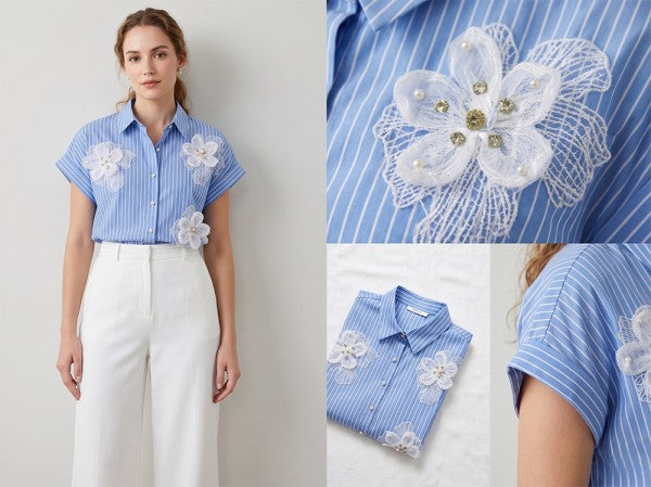 Top azul a rayas con detalles florales 3D y botones tipo perla